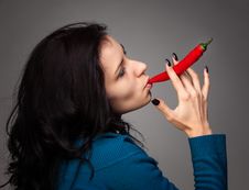 Woman Holding Red Hot Chili Pepper In Mouth Royalty Free Stock Photos Woman Holding Red Hot Chili Pepper In Mouth Royalty Free Stock Photos