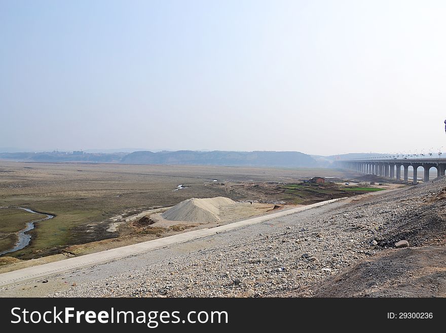 A view of dried-up riverway &bridge in Yunxian,Shiyan of China.Han Jiang river.