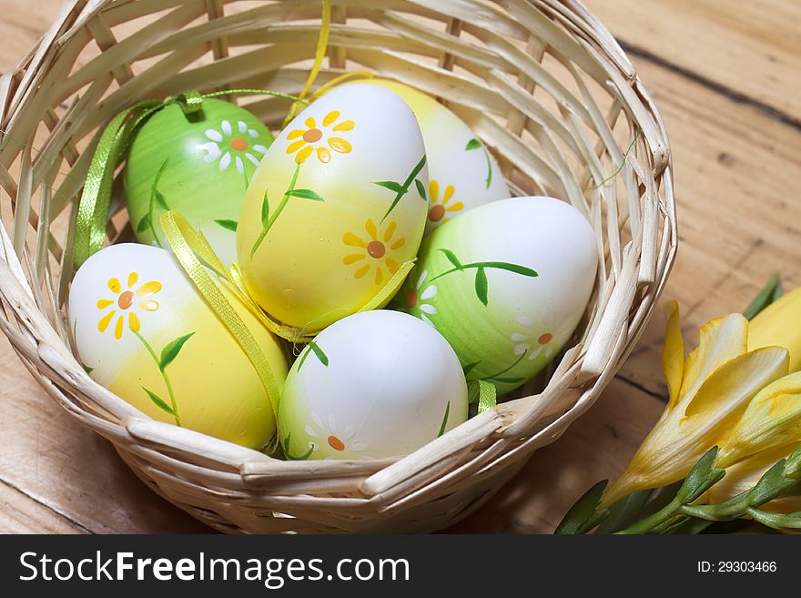 Painted Easter eggs in basket