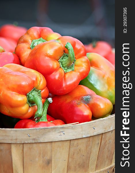 Basket of red bell peppers. Basket of red bell peppers