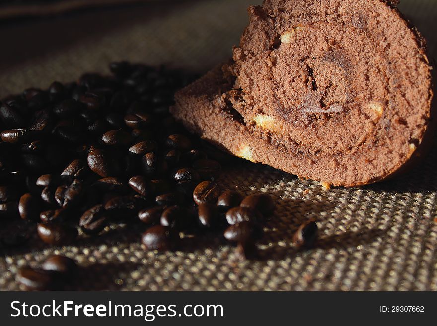 Coffee beans on the background of cake (details)