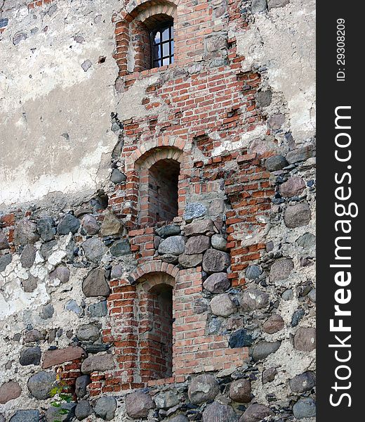 Old wall with windows. Fragment. Trakai Island Castle located in Trakai, Lithuania.