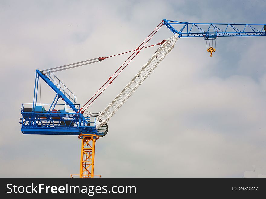 Close up of crane on blue sky with cloud. Close up of crane on blue sky with cloud