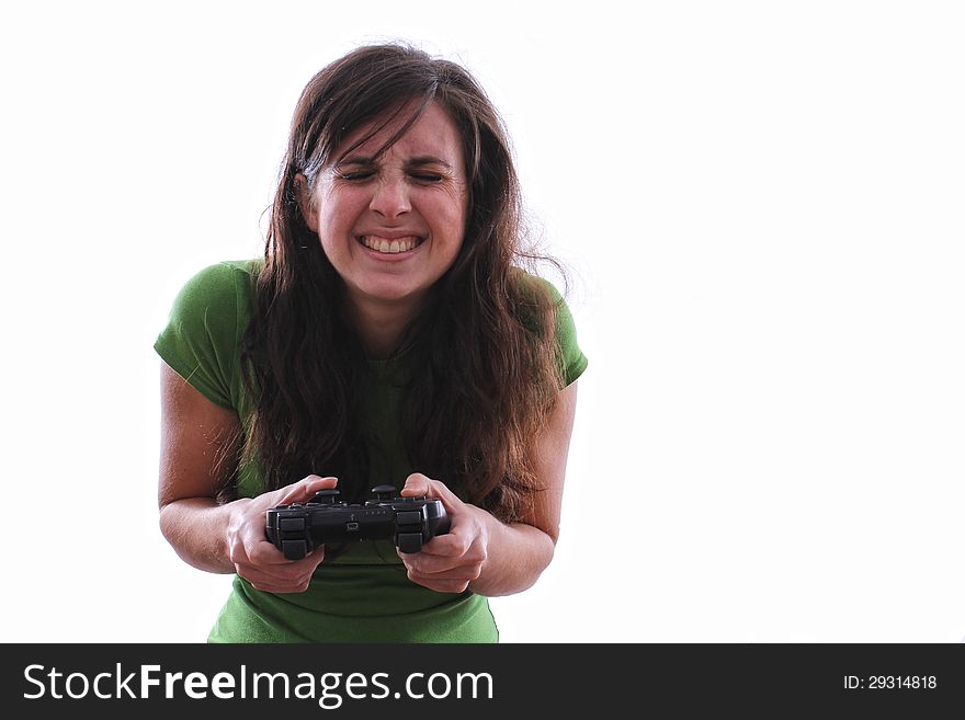 Caucasian female holding a game console controller is nervous. Caucasian female holding a game console controller is nervous