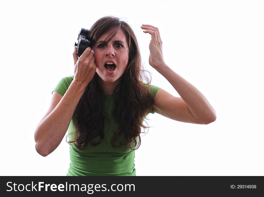 Caucasian woman has her hand with controller on her head confused with a console game. Caucasian woman has her hand with controller on her head confused with a console game