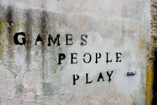 Sign On A Wall Games People Play. Vandalism, Graffiti Royalty Free Stock Photos Sign On A Wall Games People Play. Vandalism, Graffiti Royalty Free Stock Photos