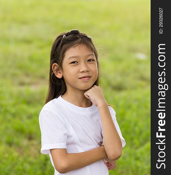 Outdoors portrait of beautiful Asian young girl. Outdoors portrait of beautiful Asian young girl