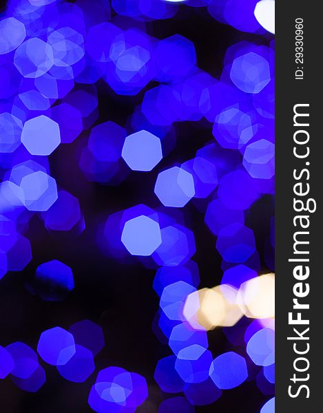 Defocused abstract blue new year lights background. Defocused abstract blue new year lights background