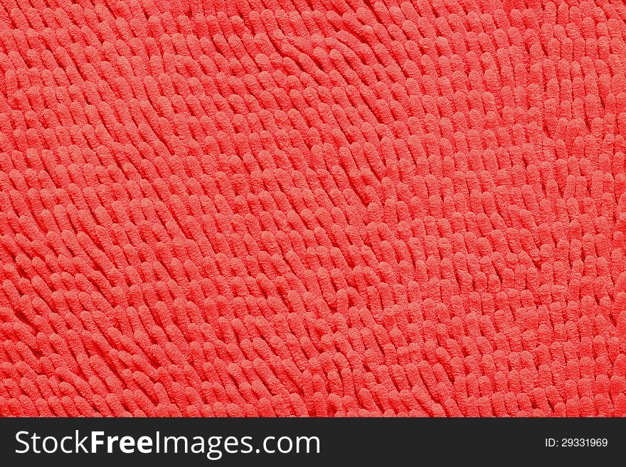 Red Microfiber bath mat in the background