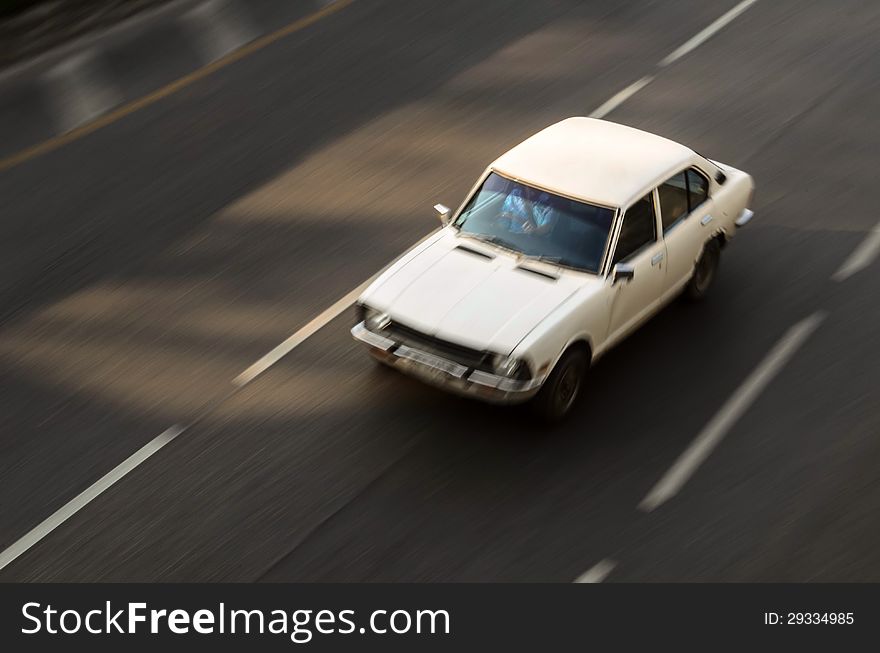 Fast car moving with a motion blur. Fast car moving with a motion blur