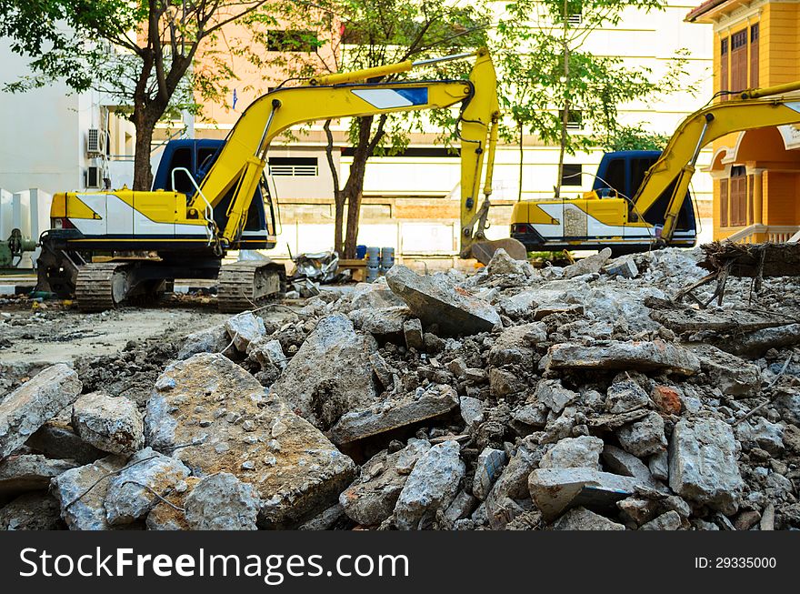 Concrete Crusher demolishing reinforced concrete structures. Concrete Crusher demolishing reinforced concrete structures