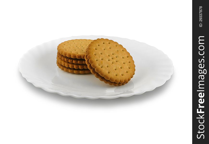 Biscuits on plate isolated on white background.