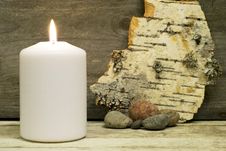 Candle, Birch Bark And Stones Royalty Free Stock Image