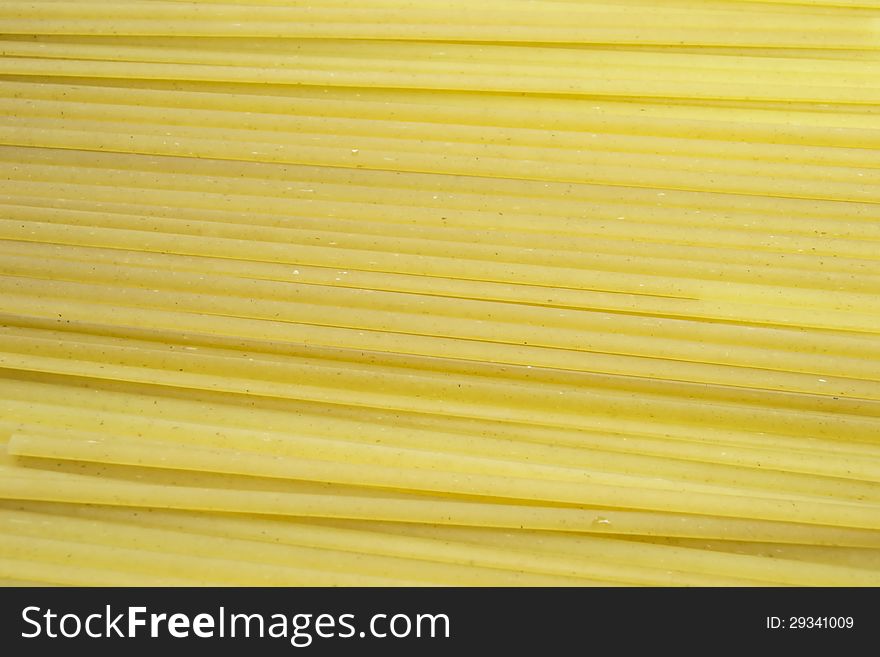 Yellow crude italian pasta texture. Yellow crude italian pasta texture