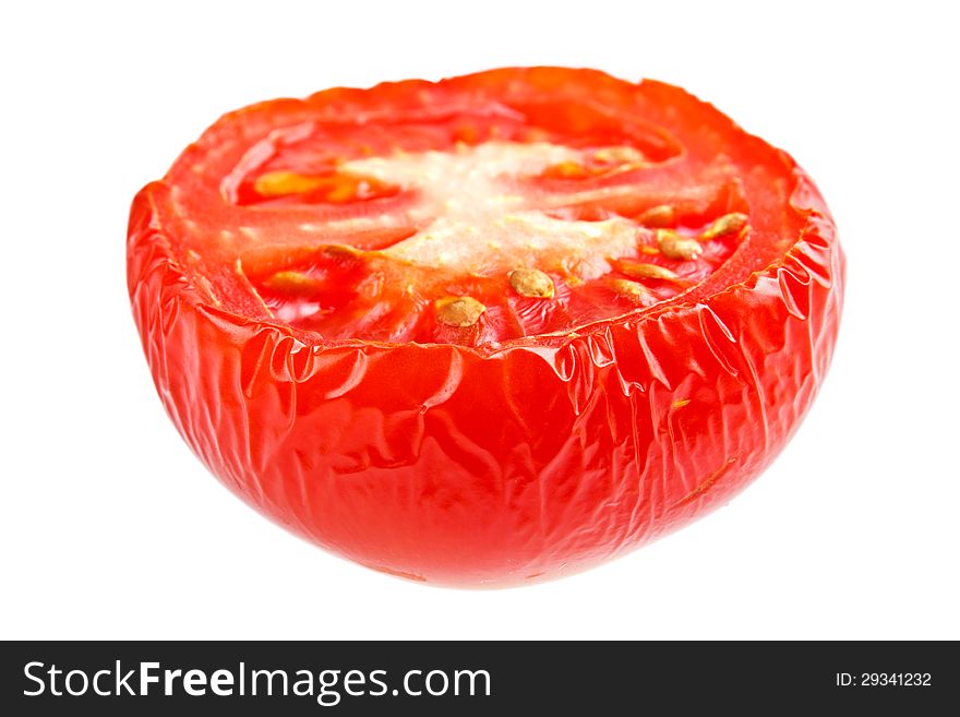 Wrinkled half tomato , isolated on white. Wrinkled half tomato , isolated on white