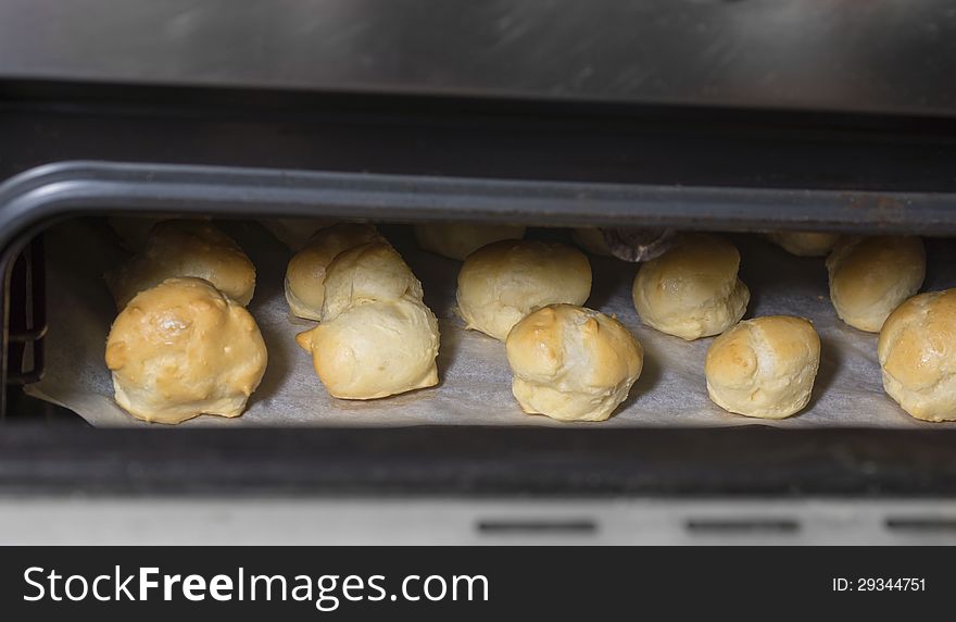 House cakes in an oven. House cakes in an oven.