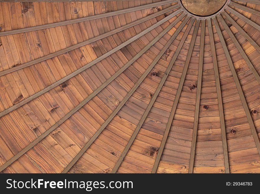 Wooden ceiling in the shape of the sun