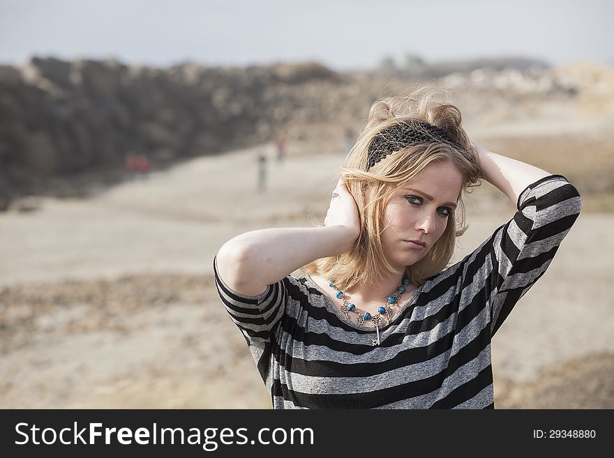 Portrait of a young woman at the beach. Portrait of a young woman at the beach.