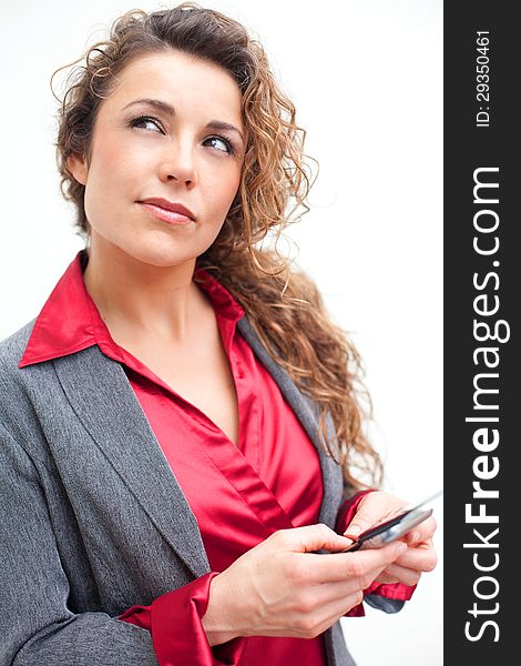 Beautiful business woman holding cellphone text messaging