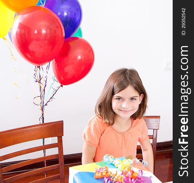 Portrait of a Caucasian little girl at her birthday party. Portrait of a Caucasian little girl at her birthday party