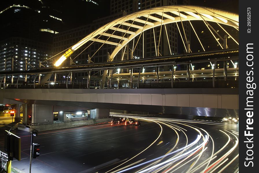 Pubic skywalk with modern buildings of Bangkok downtown square in business zone, Thailand