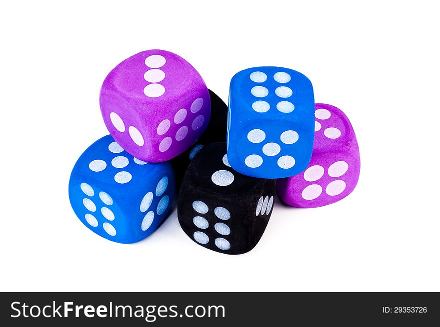 Stack of 6 dice in blue, purple, and black on white background. Stack of 6 dice in blue, purple, and black on white background.