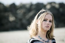 Young Woman With Beautiful Blue Eyes At The Beach Royalty Free Stock Photography Young Woman With Beautiful Blue Eyes At The Beach Royalty Free Stock Photography