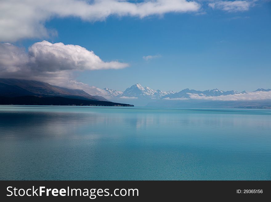 A lake near the mount cook named Lake Pukaki. The water of lake contain mineral. It result the white color. We also can look the mountain cook with snow cover