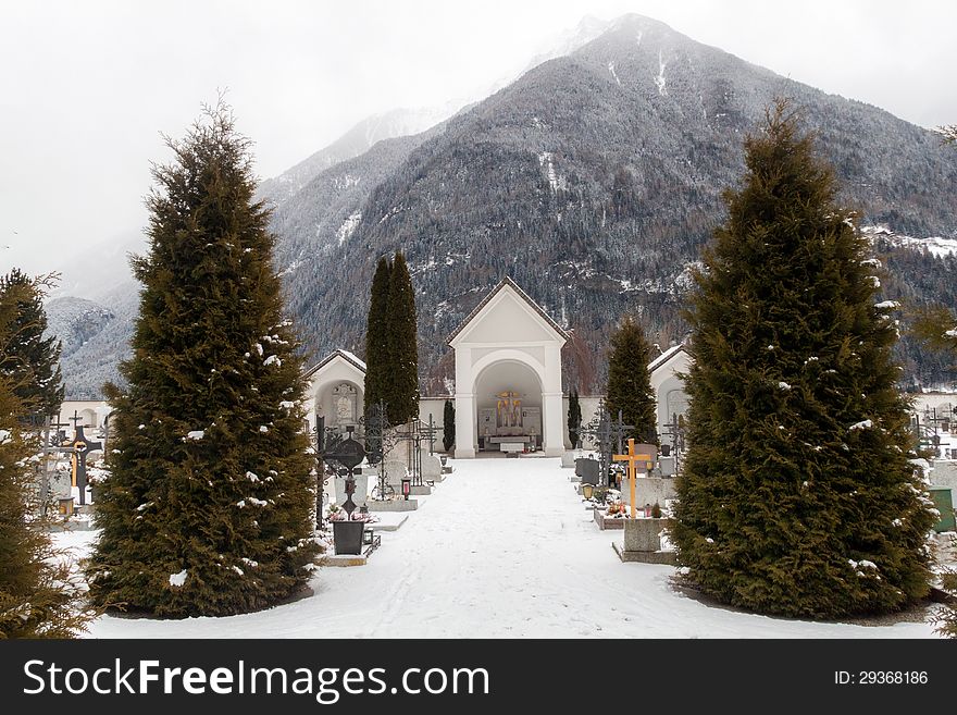 Cemetery in fog in Val Pusteria