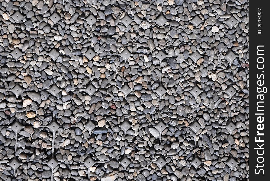 Background made of a closeup of a pile of pebbles