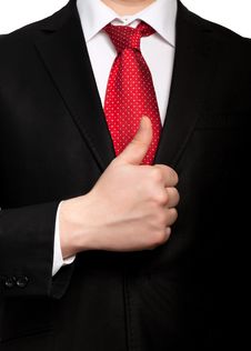 Isolated Businessman In A Suit With Red Tie Shows Well Royalty Free Stock Photos