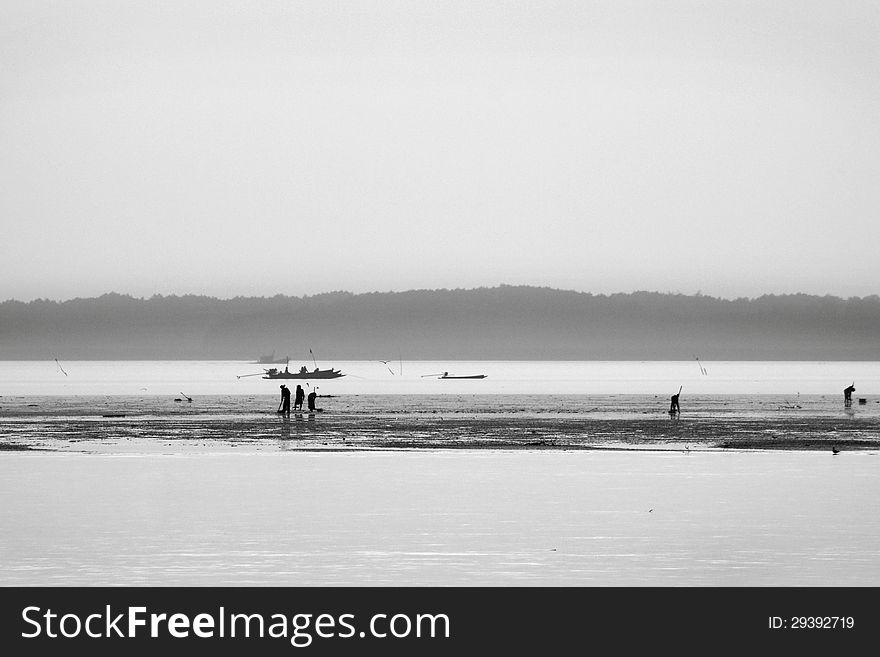 Black and white landscape boat ,people and sea. Black and white landscape boat ,people and sea