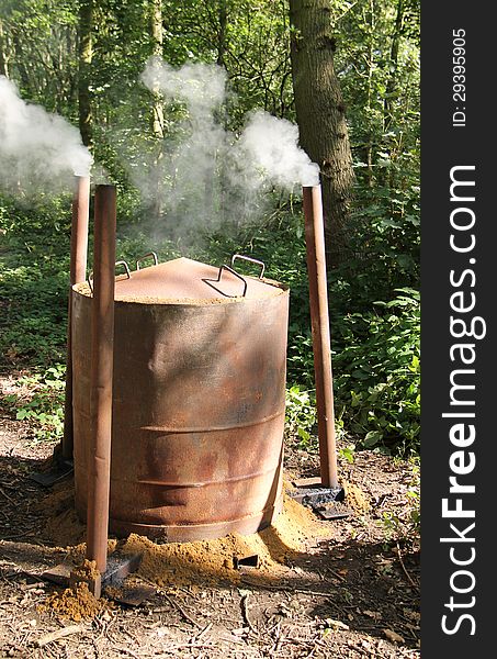 A Woodland Setting of a Charcoal Making Stove.