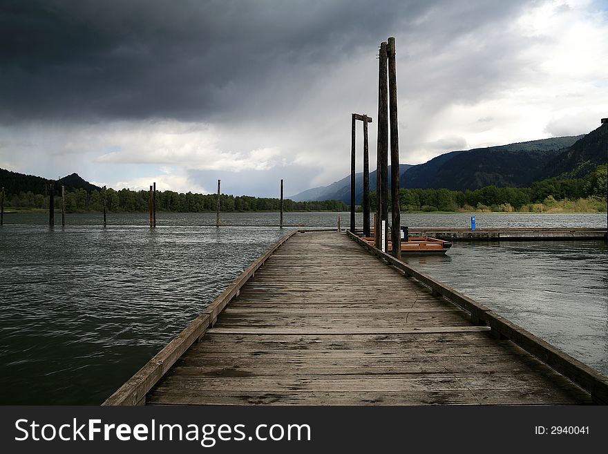 Fishing pier and boat dock on the Columbia River. Fishing pier and boat dock on the Columbia River