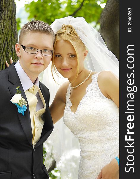 Bride and groom looking each to other. Bride and groom looking each to other