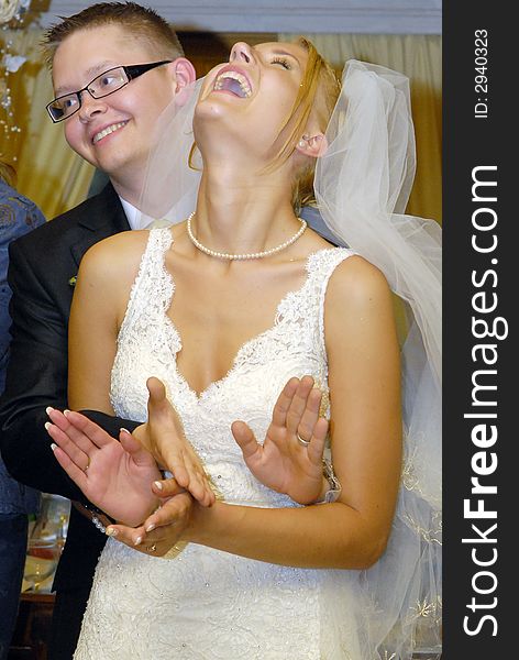 Bride and groom looking each to other. Bride and groom looking each to other