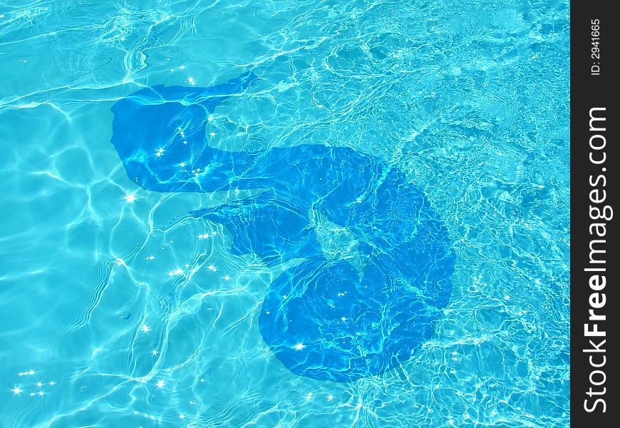 Painted sea horse in the blue water. Painted sea horse in the blue water