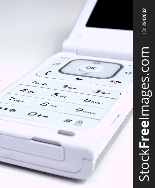 Close up of modern cellular telephone - high-key. Close up of modern cellular telephone - high-key