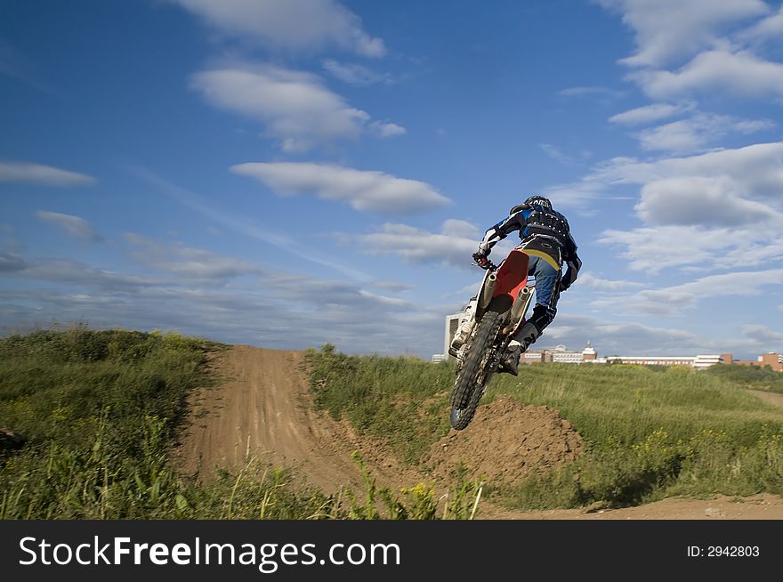 A motocross rider before touch-down. A motocross rider before touch-down