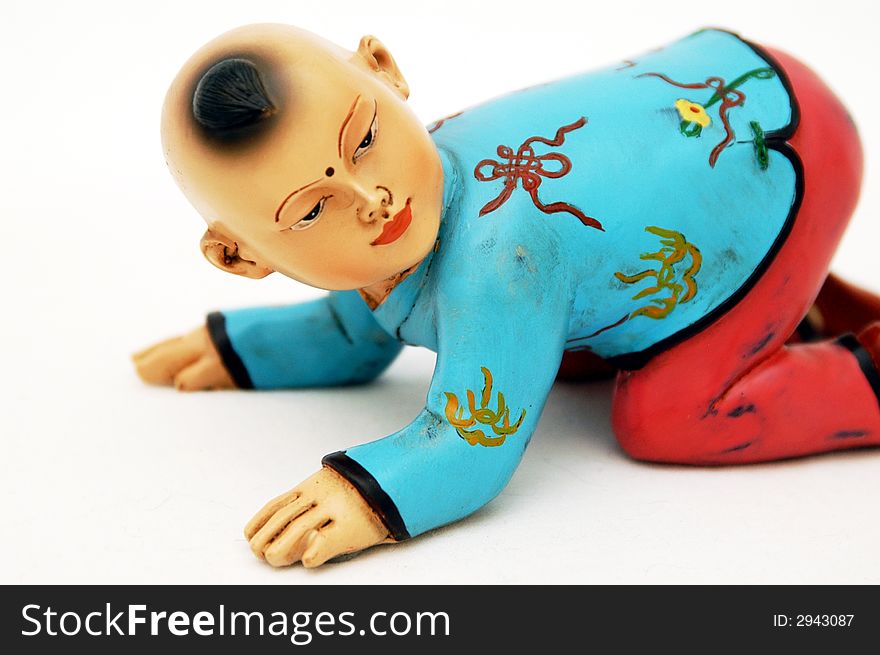 Small chinese figurine in white background