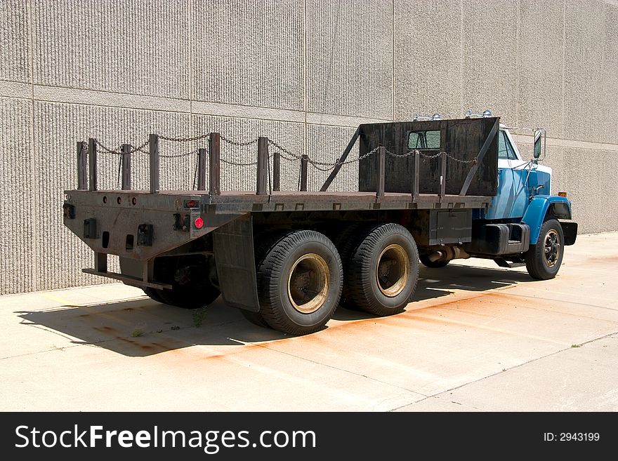 This is the rear view of a large flat bed stright truck. This is the rear view of a large flat bed stright truck.