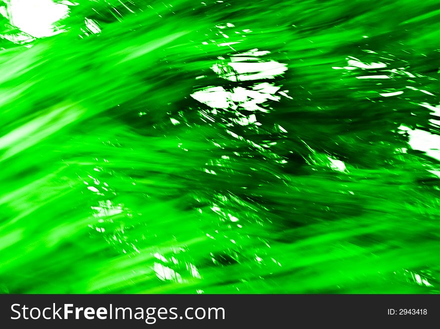 An abstract image created by using a slow shutter speed while moving and/or adjusting the focal length of the lens. Colors added and/or adjusted afterwards. An abstract image created by using a slow shutter speed while moving and/or adjusting the focal length of the lens. Colors added and/or adjusted afterwards.
