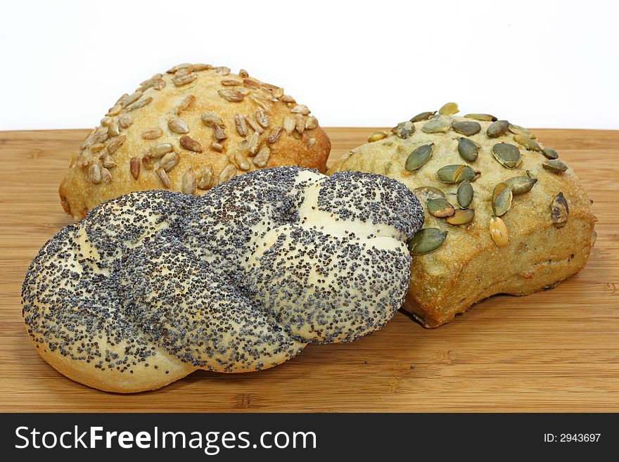 Baked bread on wooden board