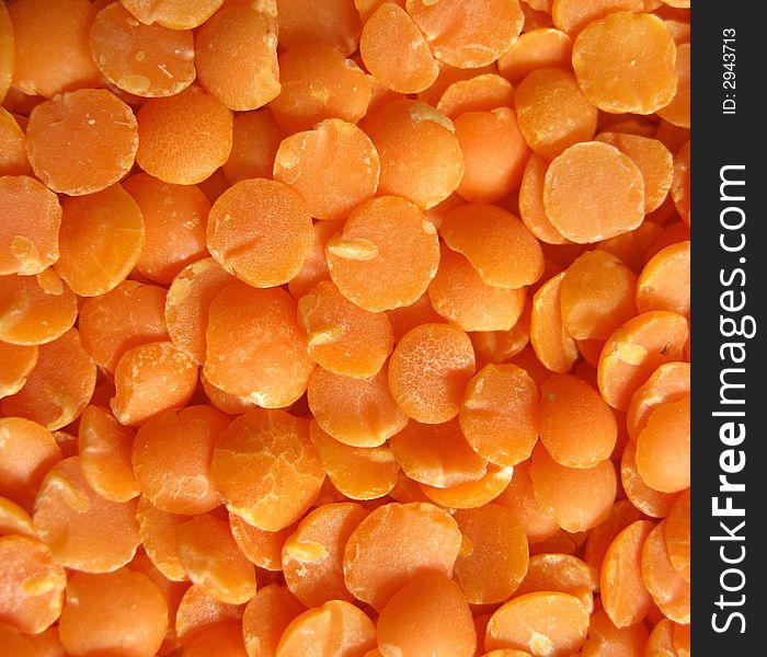 Background. Heap of a red split lentils. Background. Heap of a red split lentils