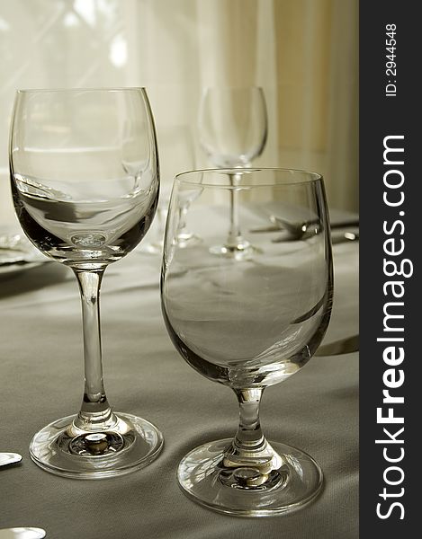 Two empty wineglasses in luxury restaurant. Two empty wineglasses in luxury restaurant