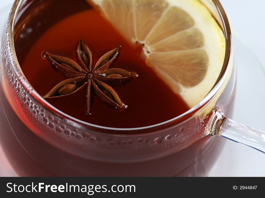 Cup of tea with anise and lemon