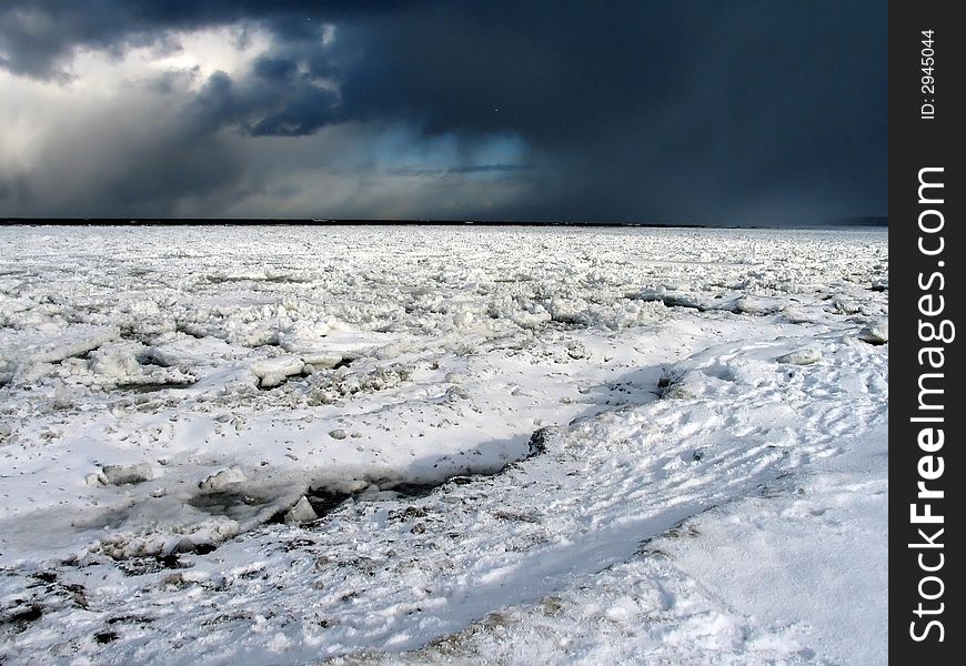 Winter storm sky over frozen sea. Winter storm sky over frozen sea