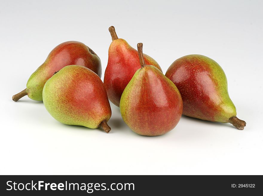 Five pears on the white background