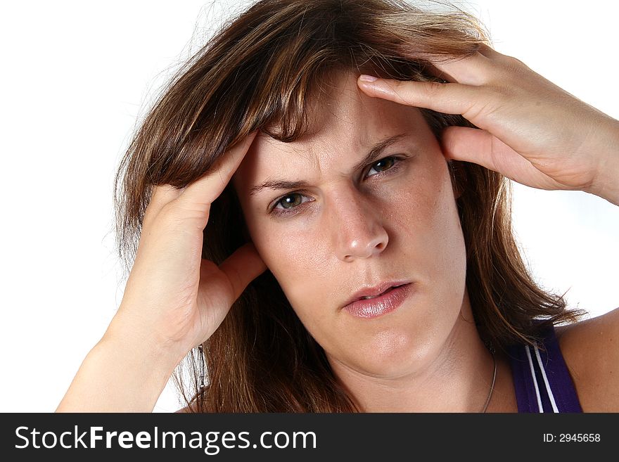 A young woman with headache is holfing her head in pain. A young woman with headache is holfing her head in pain.