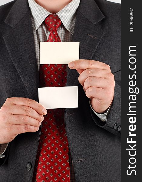 Businessman holding blank visiting cards. Businessman holding blank visiting cards